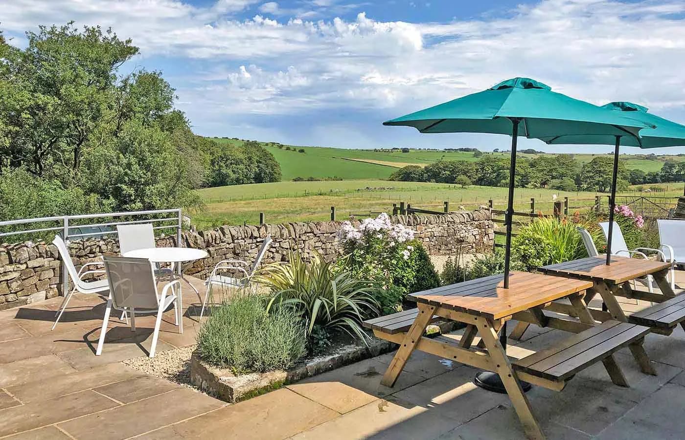 The terrace at Morridge View, facing open farmland to the ridge