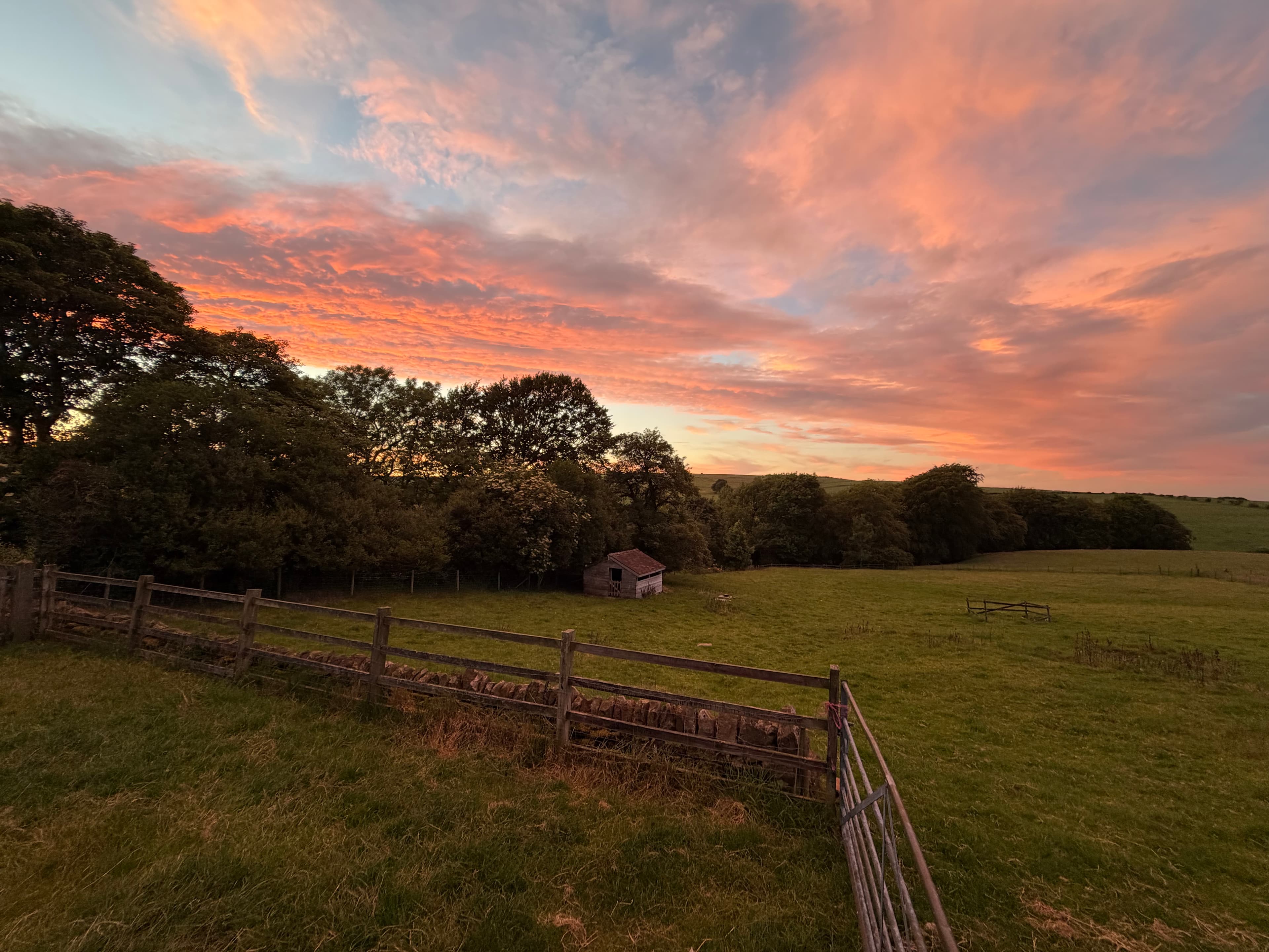 View across the fields at Lane Head Barns at dusk