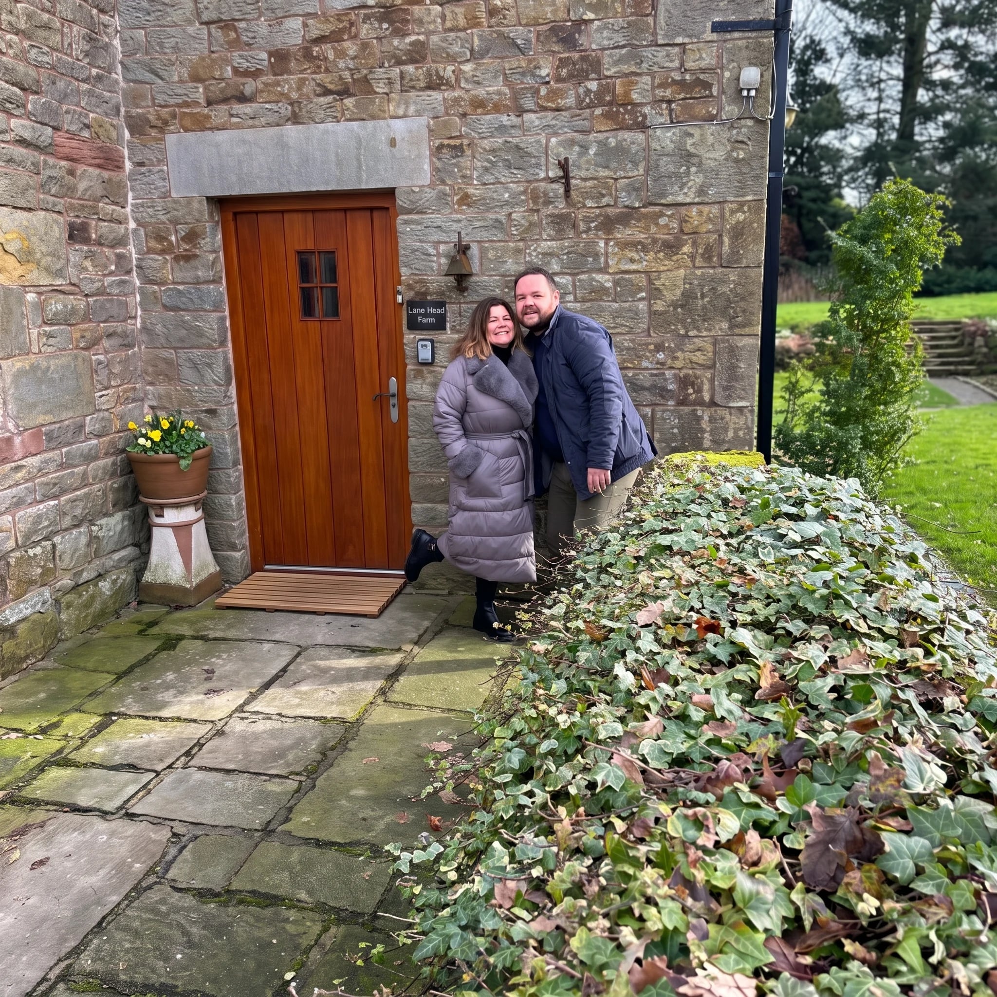 Jason and Angela at the door of Lane Head Farm